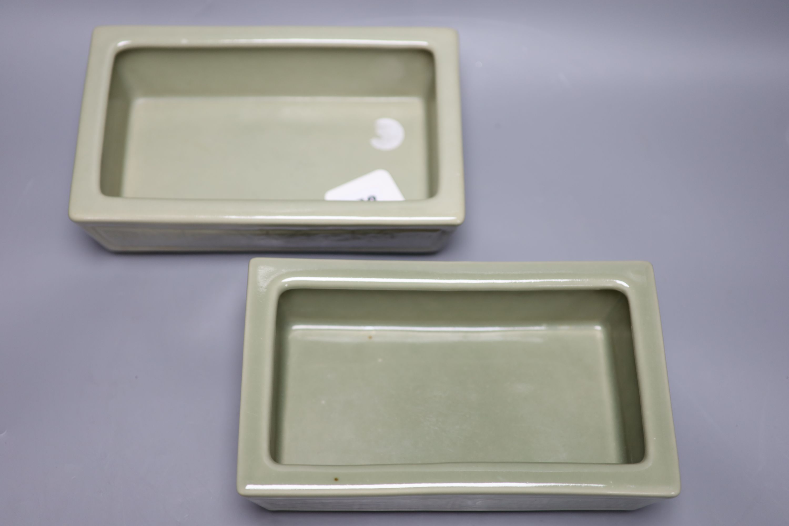 A pair of Chinese celadon glazed rectangular planters, late 19th to 20th century, length 24cm